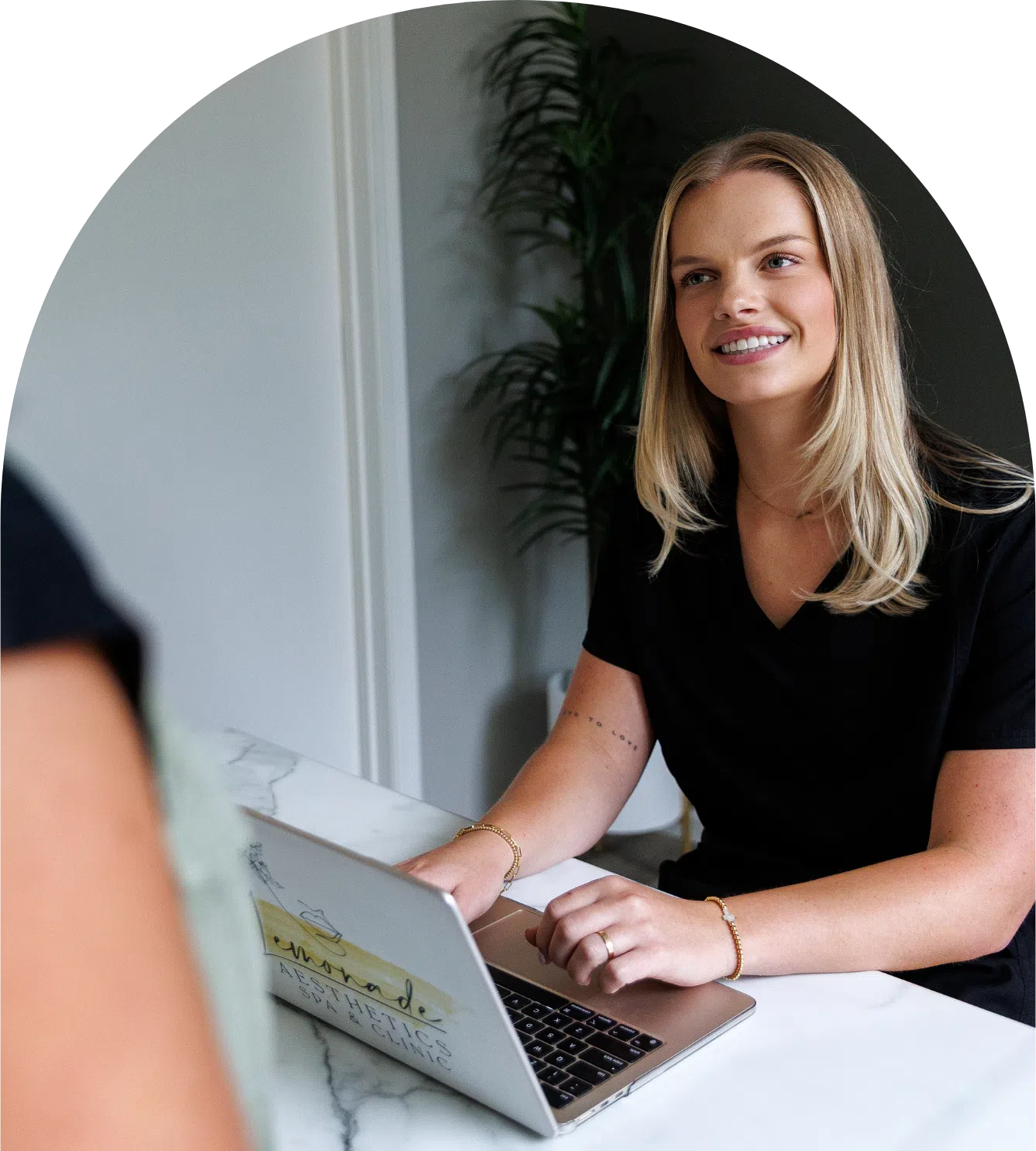 Team member scheduling an appointment at Lemonade Aesthetics